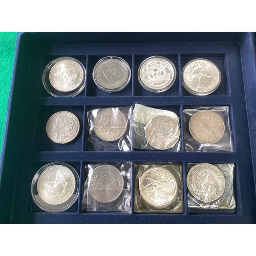 303 - A box containing coins and other collectables (see first photo for all items), including a display b... 