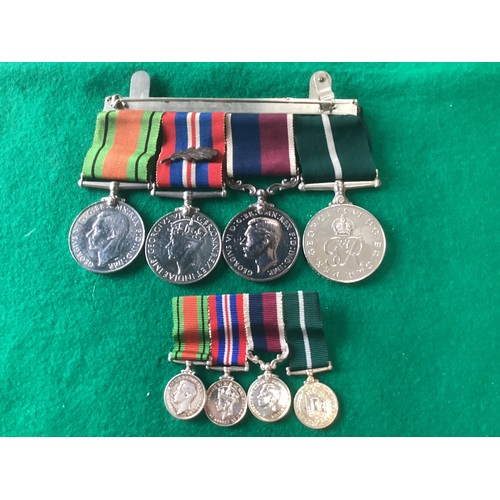 409 - A set of four RAF medals – plus the miniature copies - awarded to Flight Sgt J.E. Wood of the RAF (3... 