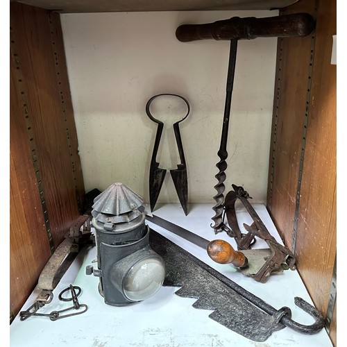 548 - A small collection of assorted wrought iron and tools including a shaving blade, various animal trap... 