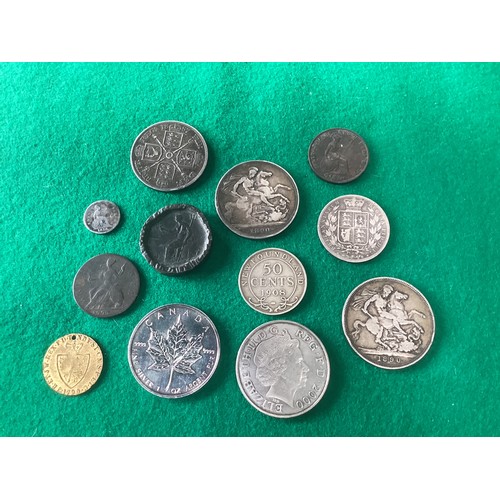 305 - A collection of mainly UK coins, with some silver, and a few foreign banknotes. Our 2nd and 3rd phot... 