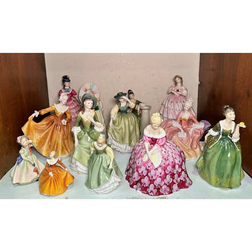 8 - A collection of thirteen assorted Royal Doulton porcelain figures of ladies, to include, Red Red Ros... 