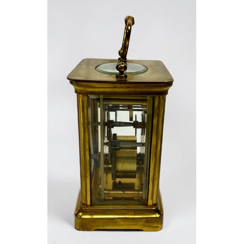 388 - An early 20th Century French brass cased carriage clock by Duverdrey & Bloquel, the white enamel dia... 