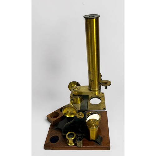 382 - A Microscope by Henry Crouch, lacquered brassware and black frame, with selection of glass specimen ... 