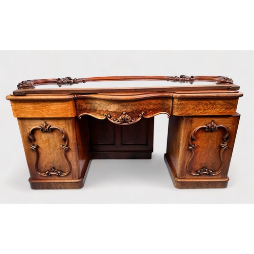 514 - A Victorian mahogany pedestal chiffonier in the rococo style, woth scrolling acanthus carved raised ... 