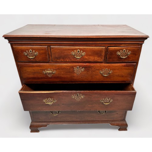 517 - A mid 18th century stained mahogany chest of drewers, comprising three short drawers above three grd... 