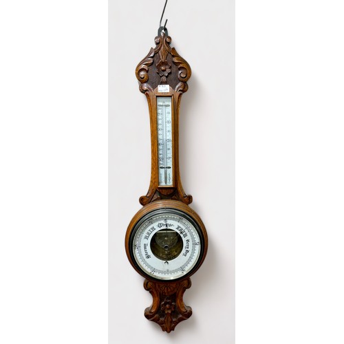 391 - A Victorian aneroid barometer with exposed movement and bellows, and mercury thermometer with dual s... 