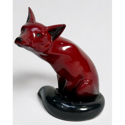 24 - A Royal Doulton large Oxblood 'Flambe' model of a seated fox, impressed number 102, 23cm high