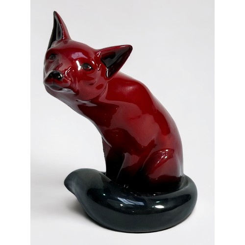 24 - A Royal Doulton large Oxblood 'Flambe' model of a seated fox, impressed number 102, 23cm high