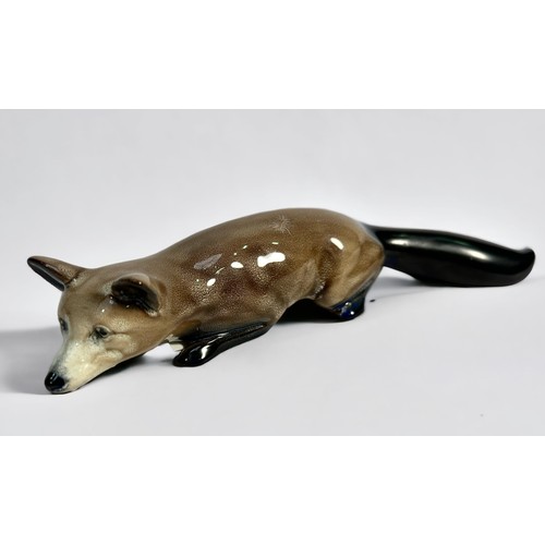 25 - A rare Royal Doulton brown and blue Flambe model 'Stalking Fox,' 23cm long model 147E