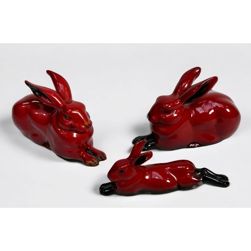 27 - Three Royal Doulton Flambe models comprising Hare Crouching 2x Style Three (one 1904-2004 Centenary ... 