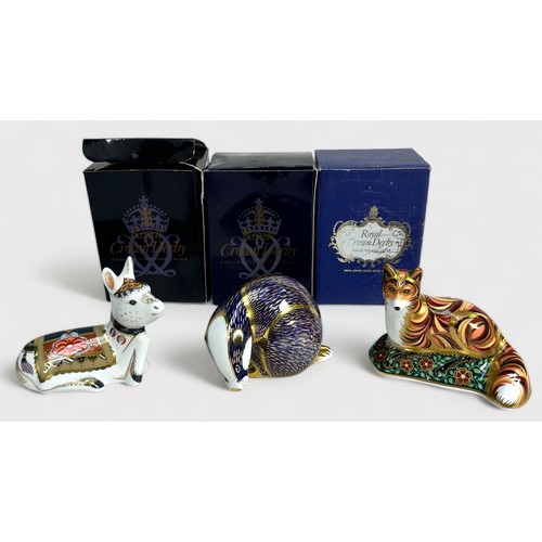 34 - Three Royal Crown Derby porcelain paperweights, Holly Donkey Foal Signature Edition, Badger and Fox ... 