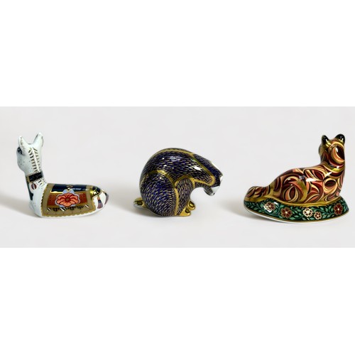 34 - Three Royal Crown Derby porcelain paperweights, Holly Donkey Foal Signature Edition, Badger and Fox ... 