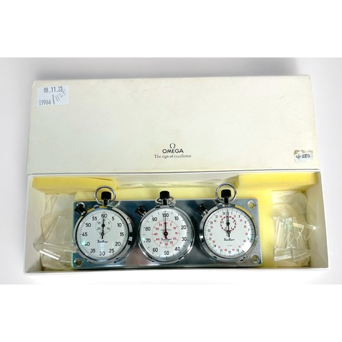 119 - A set of three chrome Hanhart stopwatches, each with white enamel dials, winding crowns to top and s... 