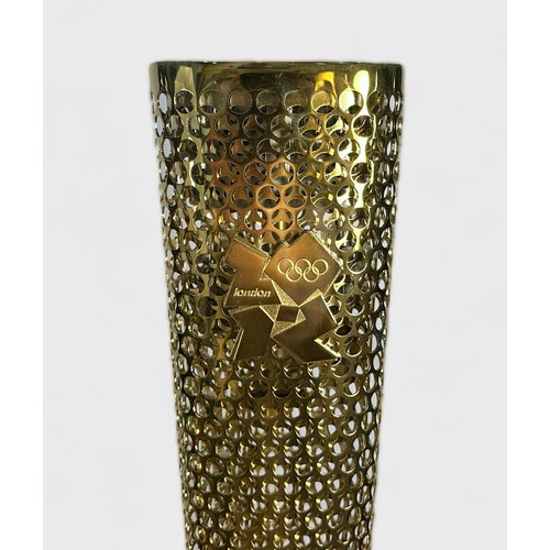 609 - A 2012 London Olympic Games Bearer's Torch, of tapering, triangular form, gold coloured, bearing the... 