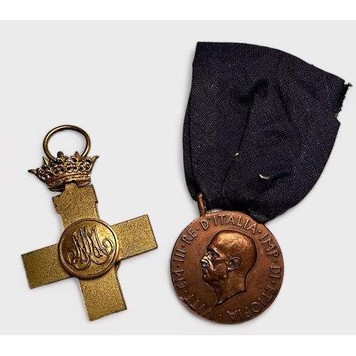 430 - An Italian East Africa Campaign Medal 1936, A Spanish Cross of Military Merit (Civil War), and a Uni... 