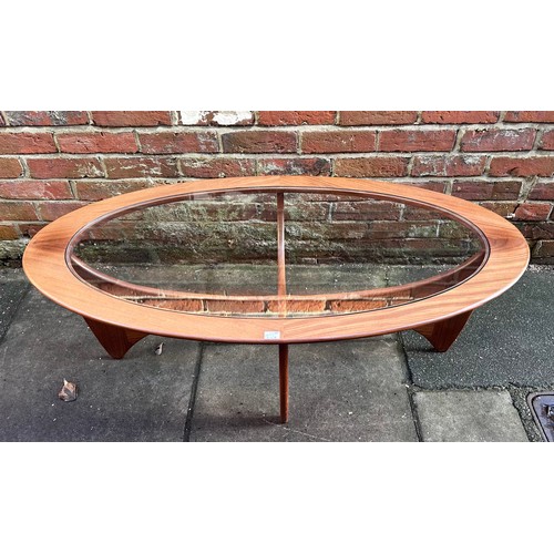 544 - A G-Plan ‘Astro’ coffee table, of oval form, with drop-in glass top to teak base, 122cm long