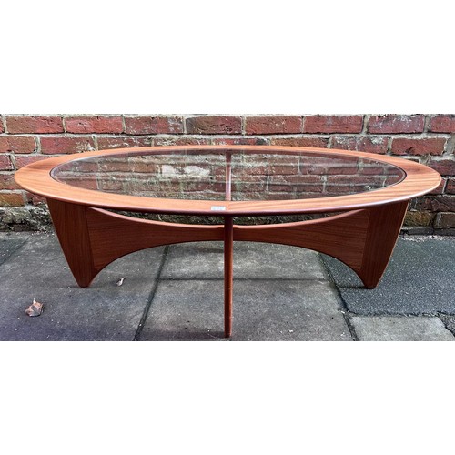 544 - A G-Plan ‘Astro’ coffee table, of oval form, with drop-in glass top to teak base, 122cm long