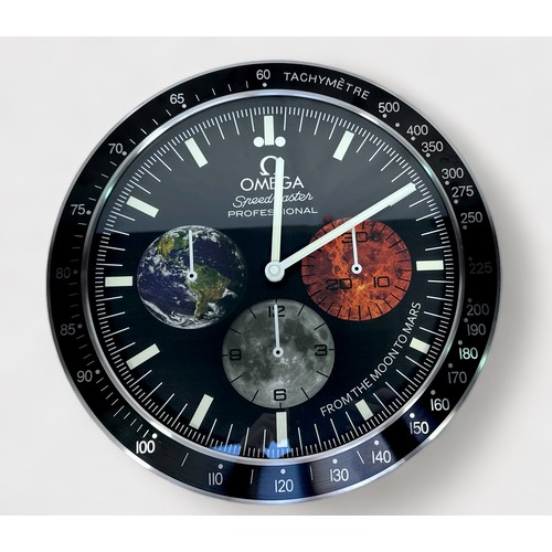 141 - A wall clock, probably from an Omega AD, modelled as an Omega Speedmaster Professional ‘From the Moo... 