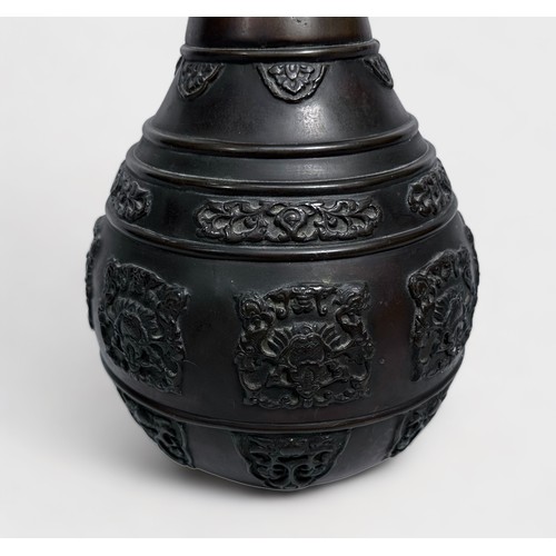 75 - A Chinese cast and patinated bronze vase, late Qing Dynasty, of globular form with elongated neck mo... 