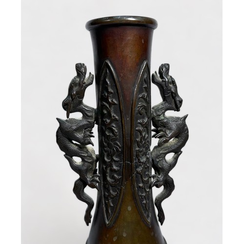 75 - A Chinese cast and patinated bronze vase, late Qing Dynasty, of globular form with elongated neck mo... 