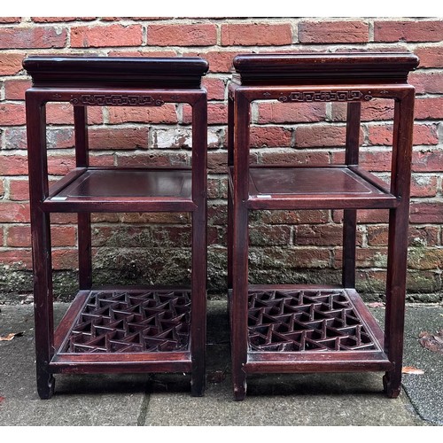 530 - A pair of early 20th century Chinese Rosewood three-tier occasional tables, of square section with p... 