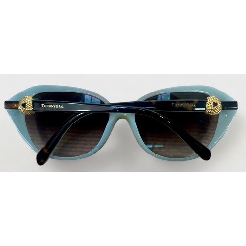 358 - A pair of Ladies Tiffany & Co Sunglasses, TF4098, tortoiseshell frames with opaque sky-blue laminate... 