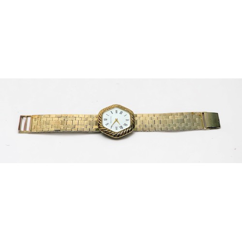 153 - A vintage 9ct gold cased Bueche-Girod wristwatch, the hexagonal white enamel dial with Roman numeral... 