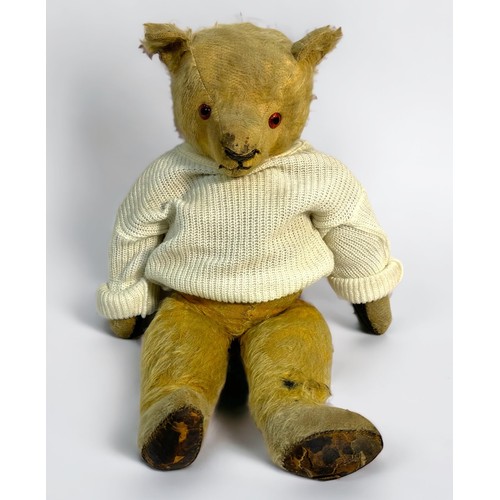 600 - A vintage plush teddy bear, with five-piece jointed body, leather feet-pads and hands, (af)