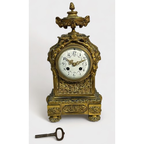 393 - A 19th Century Ormolu mantel clock, with eight-day movement striking a bell, maker's name A.D. Mougi... 