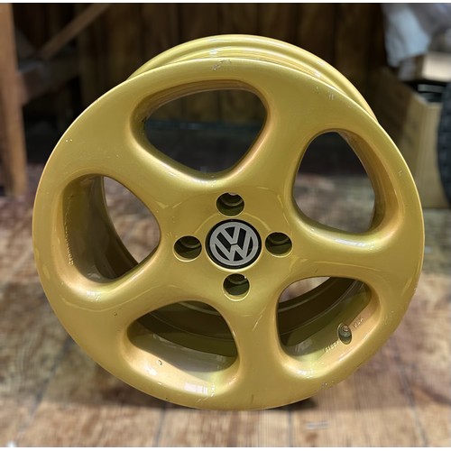 685 - A Volkswagen gold-coloured wheel, produced in 2012 by Pon Holdings (Importer of Volkswagen to the Ne... 