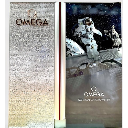 A metal Omega authorised dealer shop display sign advertising