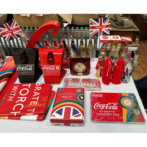 678 - A large collection of assorted Coca-Cola memorabilia, most relating to London 2012, to include, two ... 