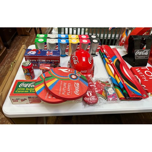 678 - A large collection of assorted Coca-Cola memorabilia, most relating to London 2012, to include, two ... 