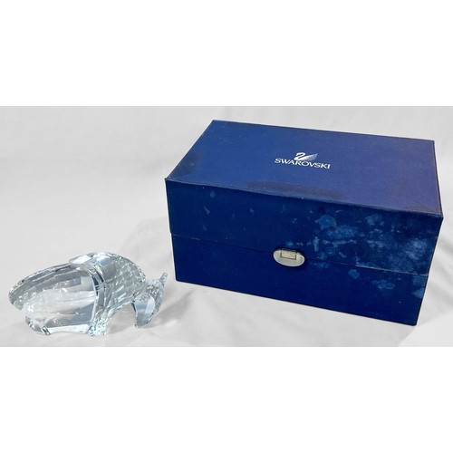 2 - A boxed Swarovski Crystal figure of a bison / buffalo, made of clear cut-glass with faceted head and... 