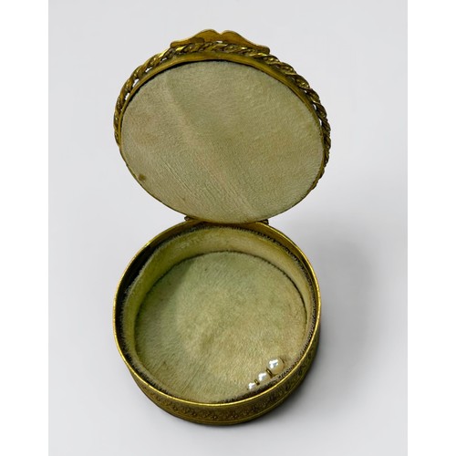 160 - An early 19th century gilt-brass circular box and cover, the top with central 'Gainsborough style' p... 