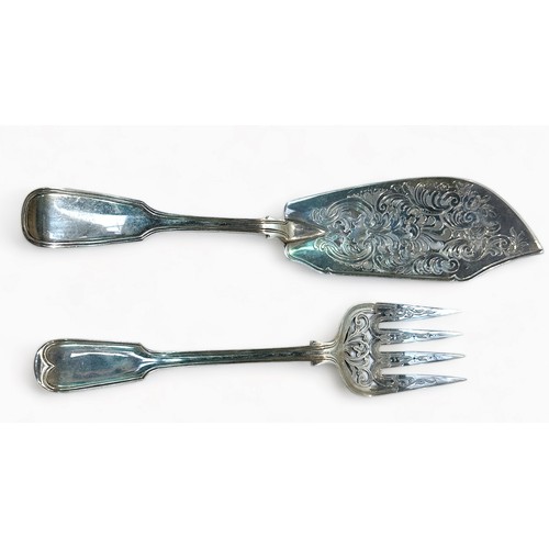 91 - A pair of Victorian sliver fish servers by Chawner & Co. With pierced and foliate declaration, hallm... 