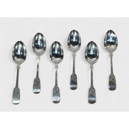 93 - A set of six Edwardian silver spoons by Charles T Maine, with bright cut foliate decoration and init... 