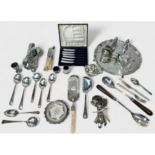 99 - A good collection of assorted silver-plated hollowware and flatware including a cocktail shaker, a M... 