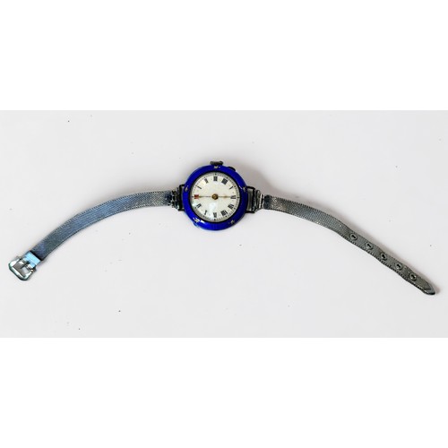 132 - A ladies early 20th century silver and enamel wristwatch, Swiss movment, white enamel dial with Roma... 