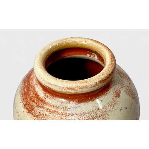 10 - A Moorcroft Pottery ovoid vase with 'weathered' orange lustre glaze, impressed mark to base, 16cm hi... 