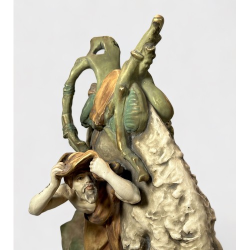 7 - A large late 19th/early 20th century 'Amphora'  Porzellanfabrik orientalist figure group of a camel ... 