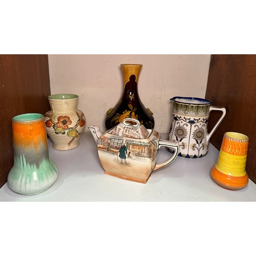 28 - Various English ceramics including Doulton 'Mr Micawbar' teapot, Clarice Cliff vase, two Shelly vase... 