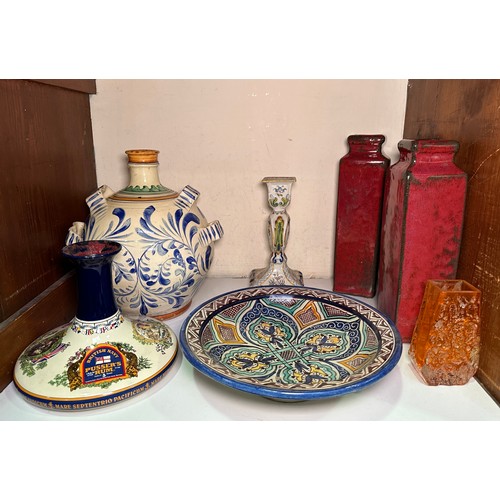 23 - A Moorish tin-glazed pottery wall charger, 'Tangerine' glass coffin vase, Wade pusser's rum decanter... 