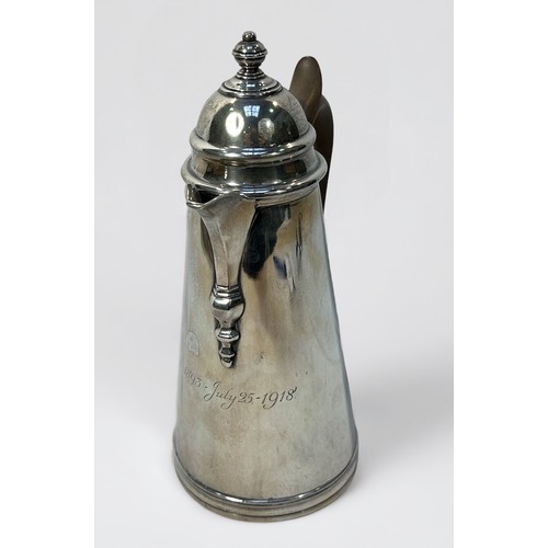 106 - A George V silver hot-water jug by S W Smith & Co. Of tapering cylindrical form with hinged dome cov... 