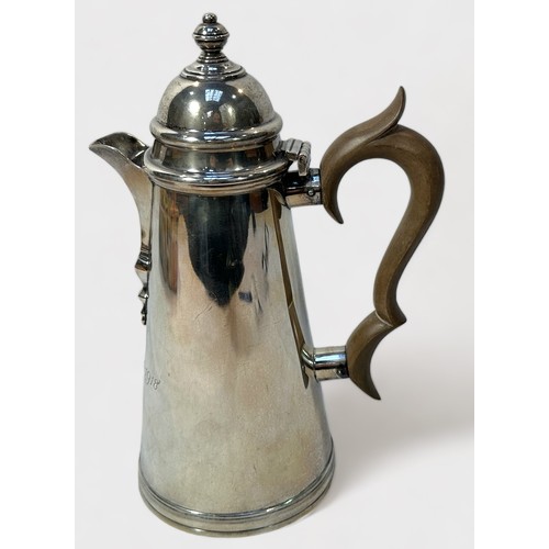 106 - A George V silver hot-water jug by S W Smith & Co. Of tapering cylindrical form with hinged dome cov... 