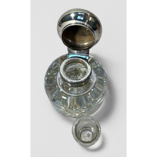 105 - A Victorian Goliath cut glass inkwell of domed form, with silver mounted top and hinged domed cover ... 