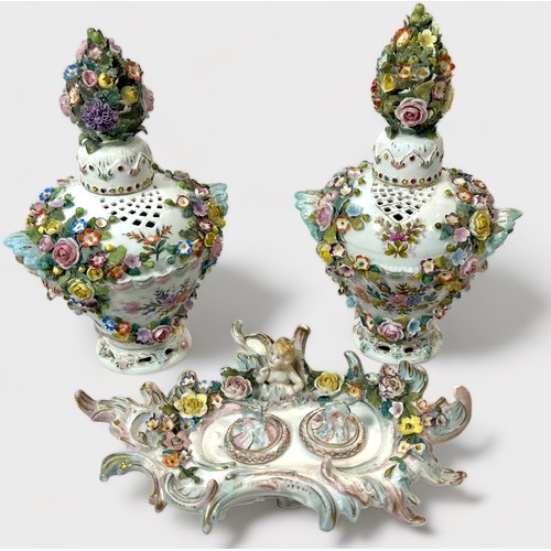38 - A pair of 19th c entury Dresden 'style' flower-encrusted pierced pot-pourri vases and covers with ch... 
