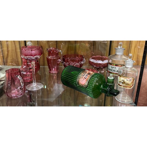 36 - Four 19th century glass apothocary bottles together with eight Cranberry glass items. (12)