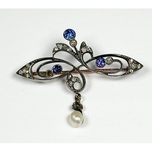 163 - A Victorian brooch, possibly upcycled from a larger piece of jewellery, scrollwork design, set with ... 