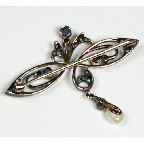 163 - A Victorian brooch, possibly upcycled from a larger piece of jewellery, scrollwork design, set with ... 